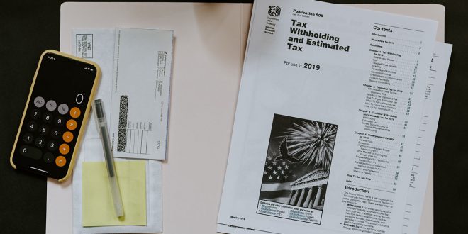 الفرق بين الضريبة والرسم